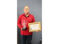 Philip Malherbe (advisor and PR for CPF cluster boards) showing the awards.