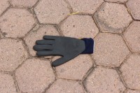 The glove that was left on the ground of the scene.