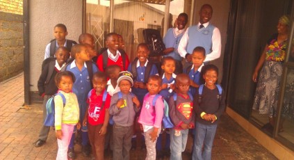 Seen here are the excited youngsters sporting their brand new school bags from Jet!