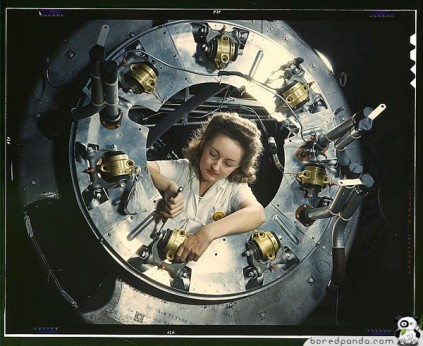 Part of the cowling for one of the motors for a B-25 bomber is assembled in the engine department of North American Aviation, Inc.'s Inglewood, Calif.1942 Oct. photographer: Palmer, Alfred T.
