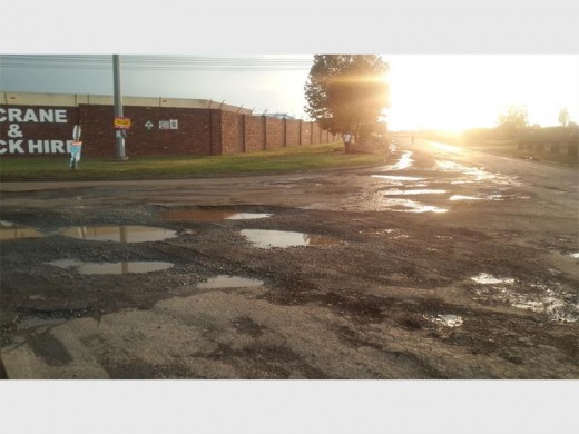 STATE OF THE ROADS: This is the corner of Bosworth South and Rivett Carnac, in Alrode South. Photo by: Peter Habib.