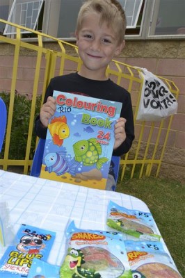 William Morsner (6 years) enjoyed the day with his dad selling toys and sweets.