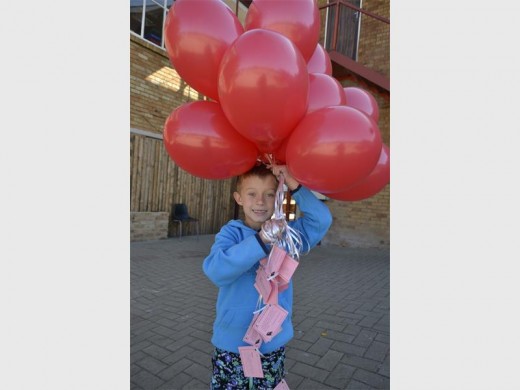 GOOD HEART: Joshua Visser (7) showed his support for the Alberton SPCA by buying many balloons. 