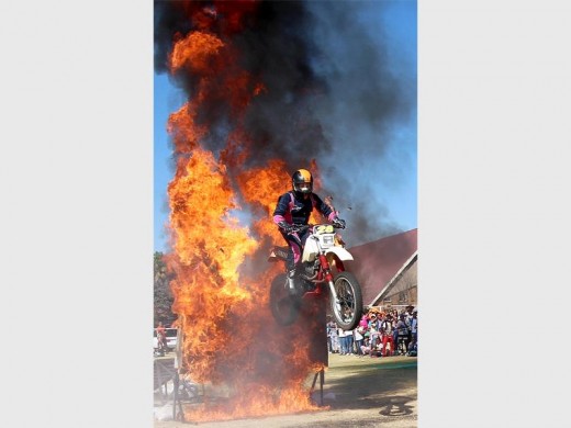 TUNNEL OF FIRE: Enrico Schoeman will jump a motorcycle through two burning caravans, parked side by side at the end of the road.