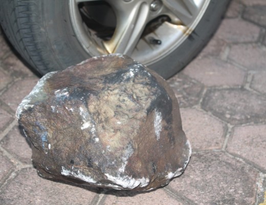 The rock that damaged Alberton Record journalist Jacobus Myburgh's vehicle after returning from Port Elizabeth.