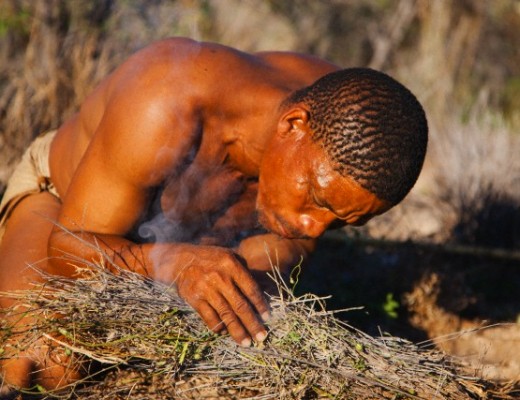 A San bushmen building a fire