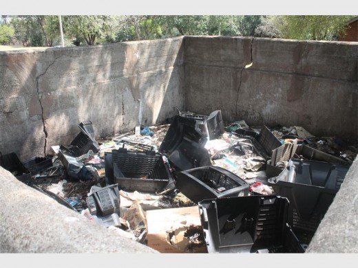 ILLEGAL LANDFILL SITE: The old Alberton water pump, the town’s first water pump at Pear Park, is being used as a dumping site for household and electronic goods. Decaying animal bones found in the pump gave off a horrible stench.