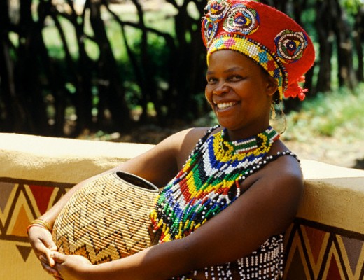 13 Feb 1999, South Africa --- Zulu woman holding a basket --- Image by © Hoberman Collection/Corbis