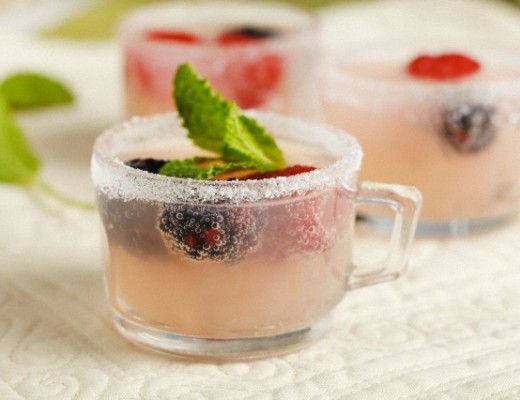 Pink Lemonade Spritzer with Fresh Berries in Small Glasses