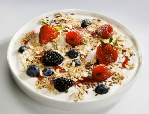 Yoghurt with berries, linseed, rolled oats and oat bran --- Image by © the food passionates/Corbis