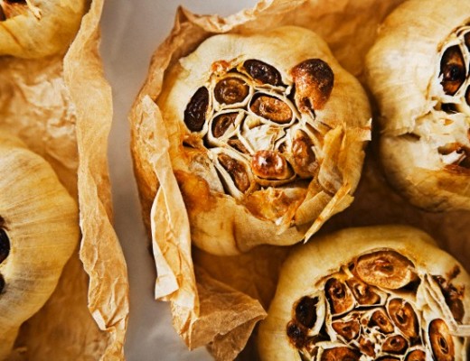 20 Apr 2009 --- Whole Roasted Garlic Bulbs --- Image by © the food passionates/Corbis