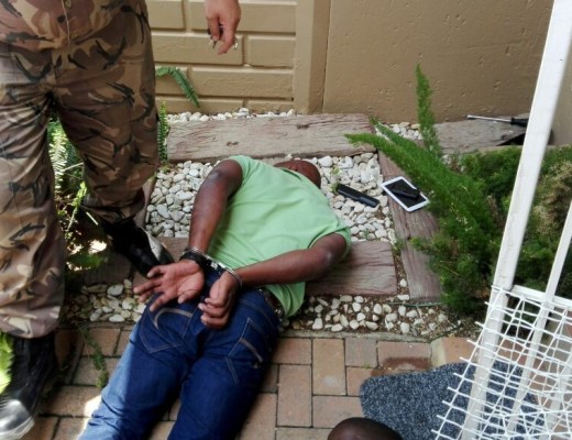 CAUGHT: One of the suspects.