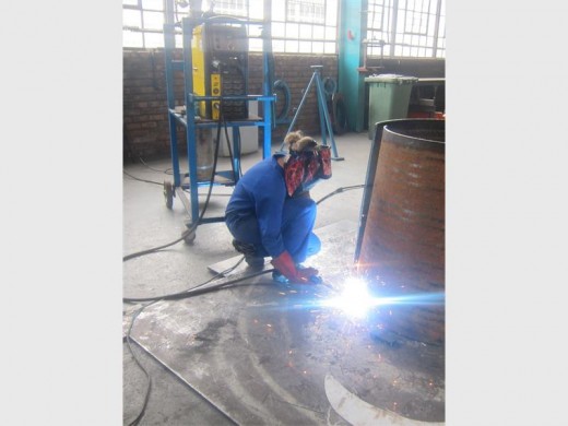 LEARNING THE TRADE: BSc Mechanical Engineering student Uma Krige tries her hand at welding. *Photo Supplied by Judette Olivier, from N-Gage.